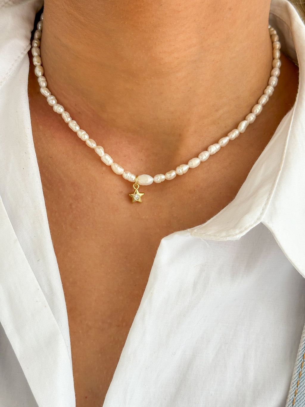 Collar perlas de río charms .5