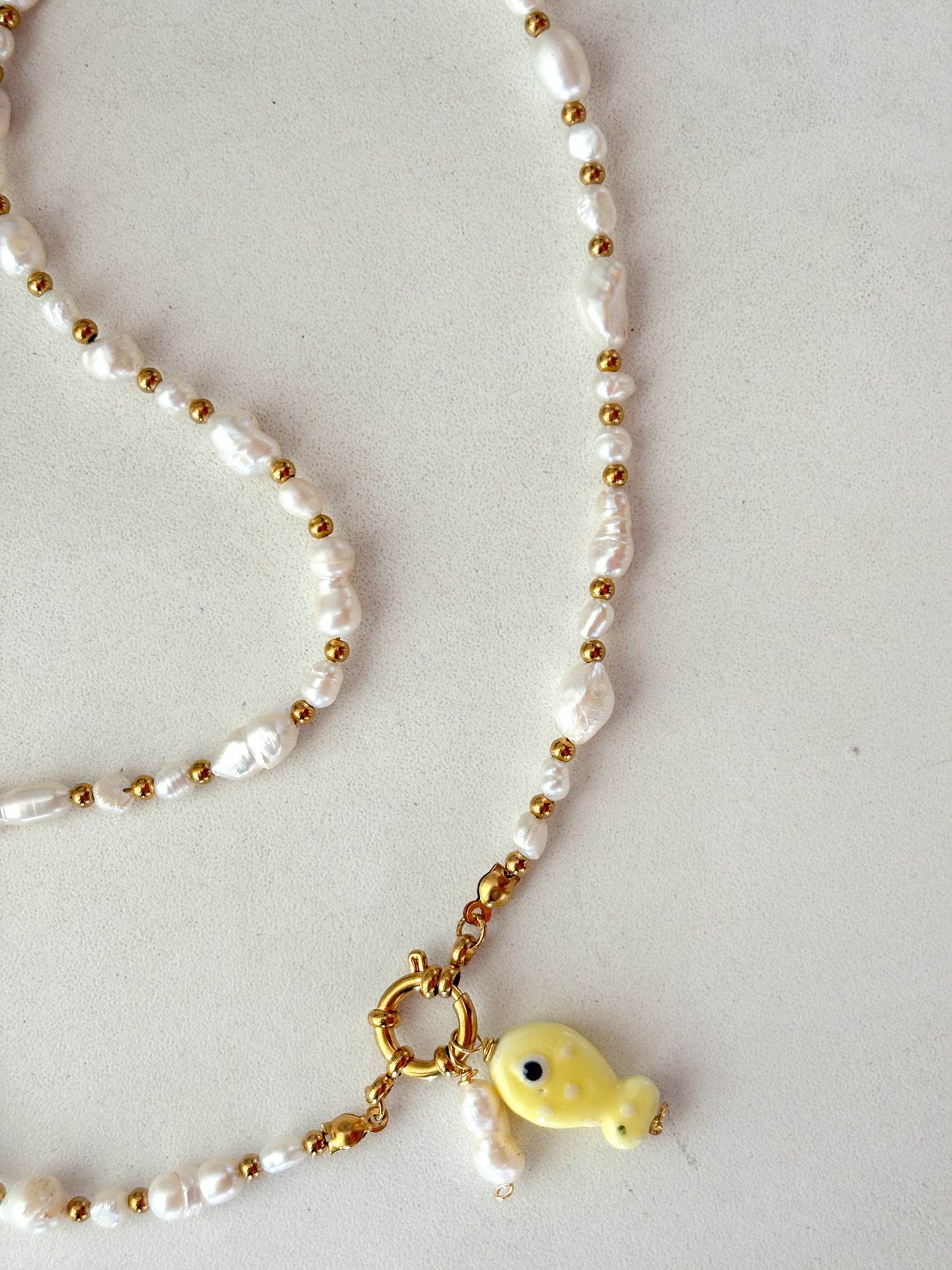 Collar perlas timón