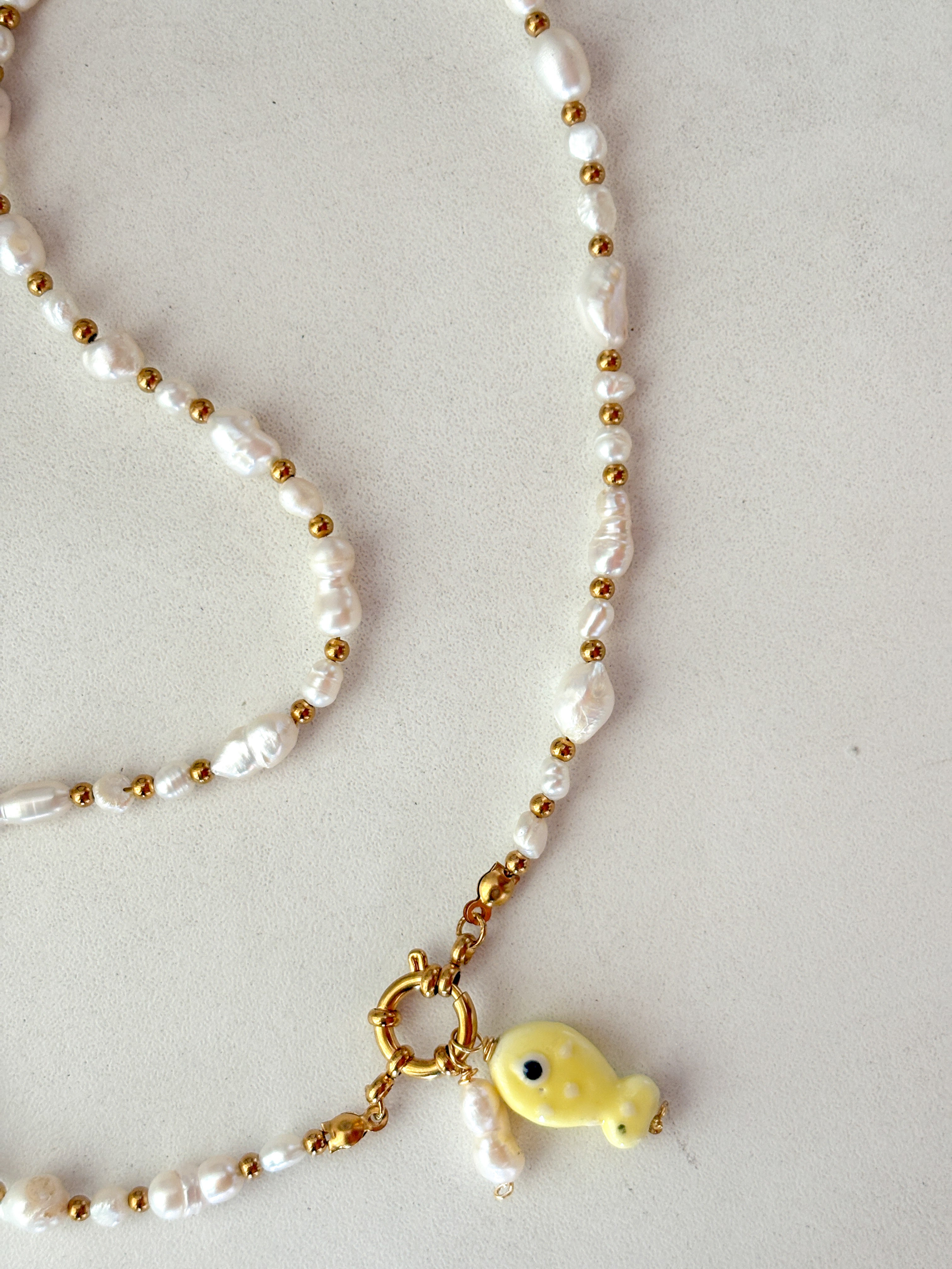 Collar perlas timón