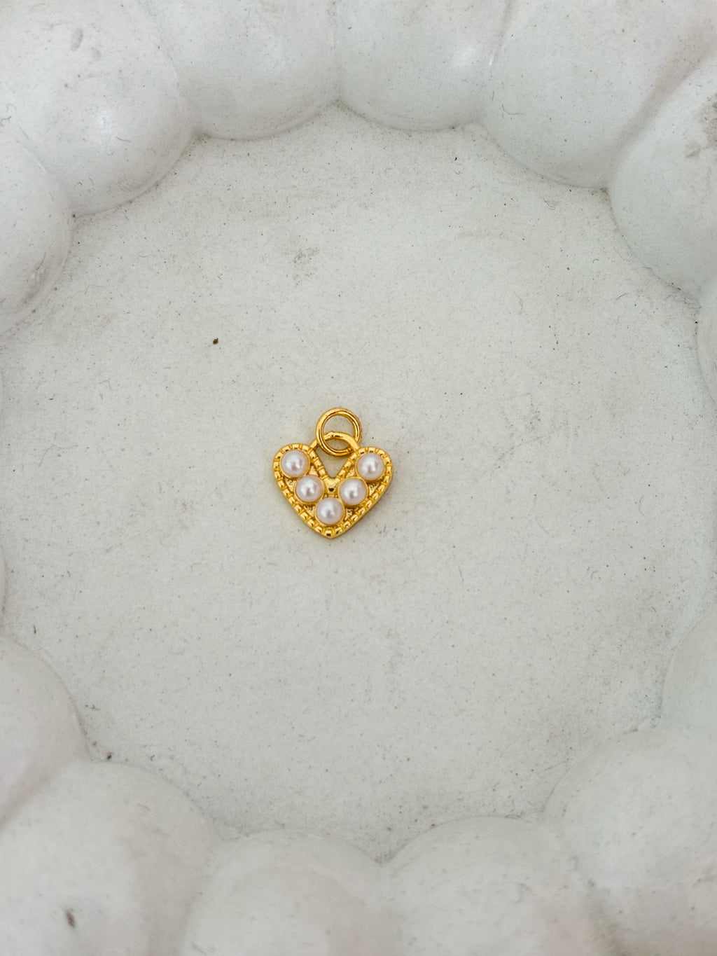 Corazón en perlas