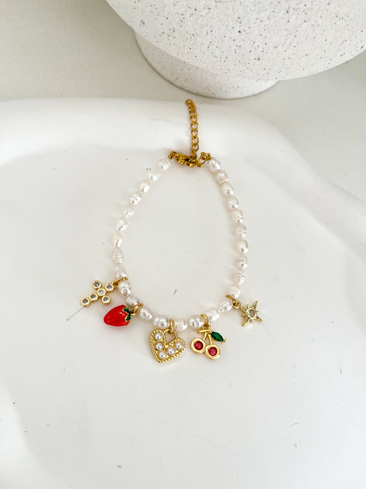 Pulsera encanto en perlas